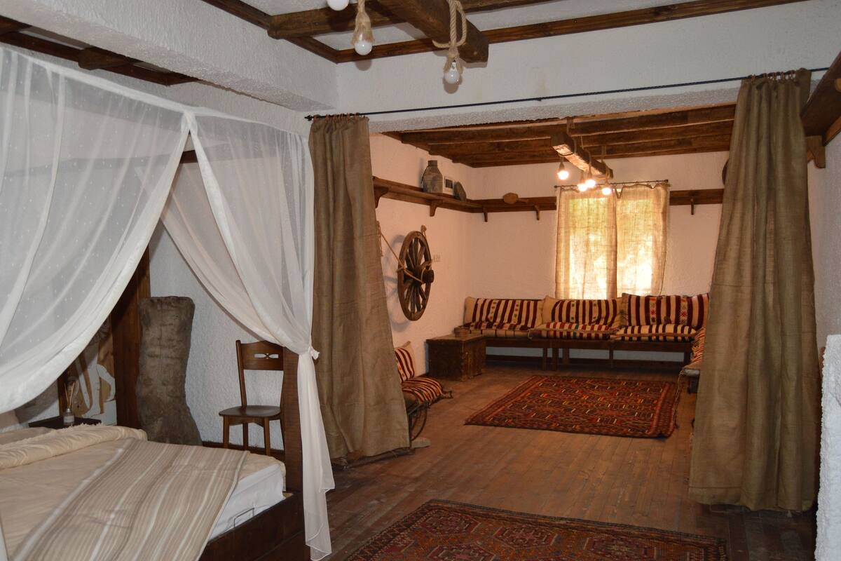 Premium bedding, desk, laptop workspace, soundproofing