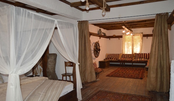 Premium bedding, desk, laptop workspace, soundproofing