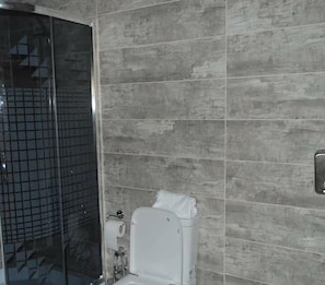 Shower, free toiletries, hair dryer, slippers