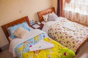 Deluxe Double or Twin Room, 2 Twin Beds | 3 bedrooms, iron/ironing board, free WiFi, bed sheets - Faithica Jkia (Syokimau)