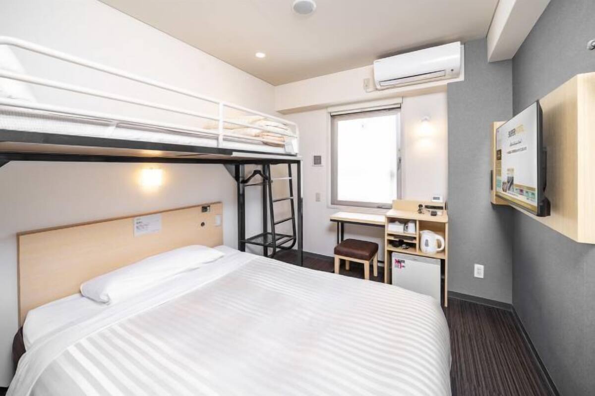 Blackout curtains, soundproofing, free WiFi, bed sheets