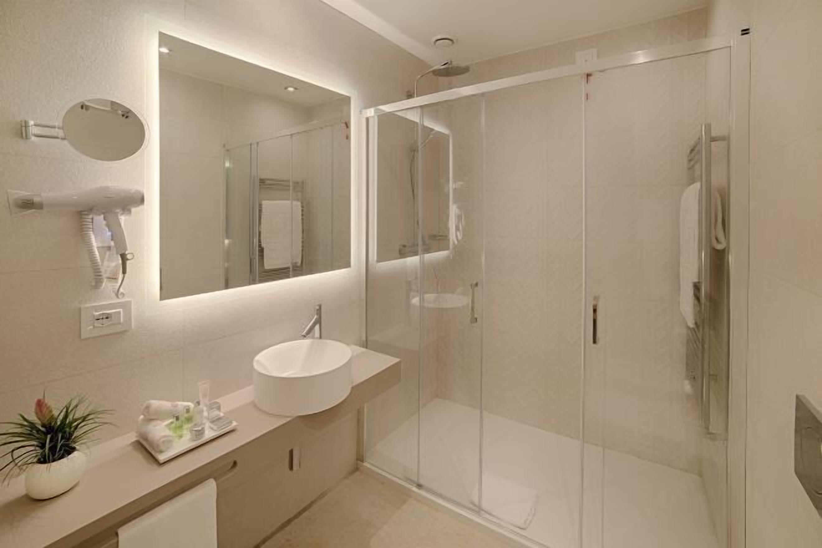 Eco-friendly toiletries, hair dryer, towels, soap