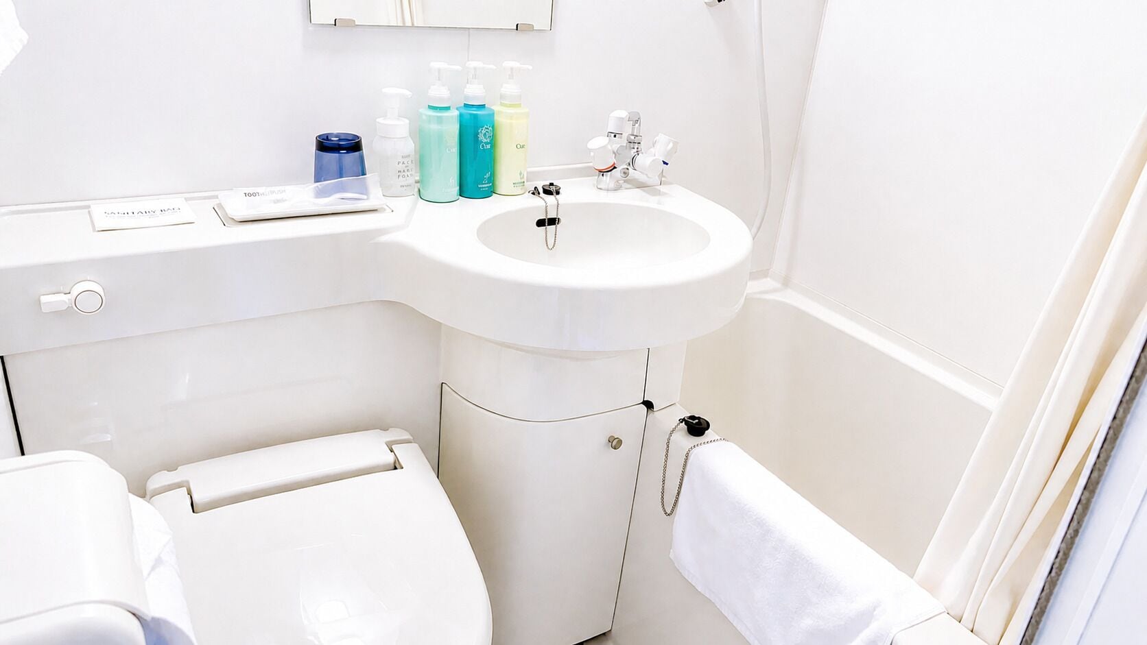 Combined shower/tub, deep soaking tub, hair dryer, bathrobes