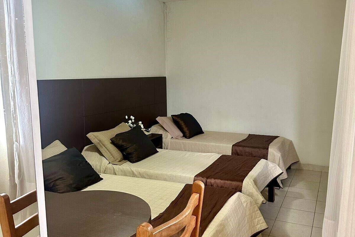 standard room, 3 single beds | desk, blackout curtains, free wifi, bed sheets