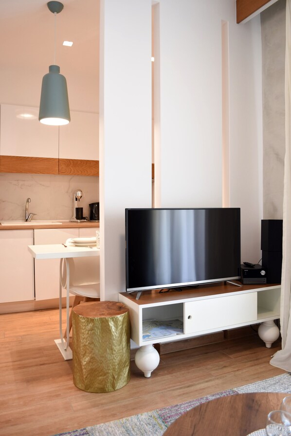 Departamento Deluxe (Armonia) | Área de sala de estar | Televisión de pantalla plana 