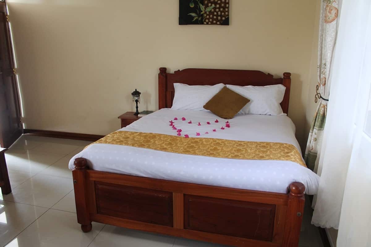 Premium bedding, memory-foam beds, in-room safe, desk