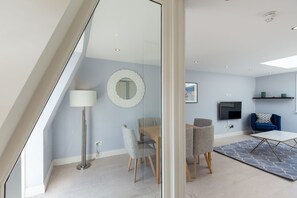 Deluxe Apartment, 2 Bedrooms | In-room safe, individually decorated, individually furnished, desk