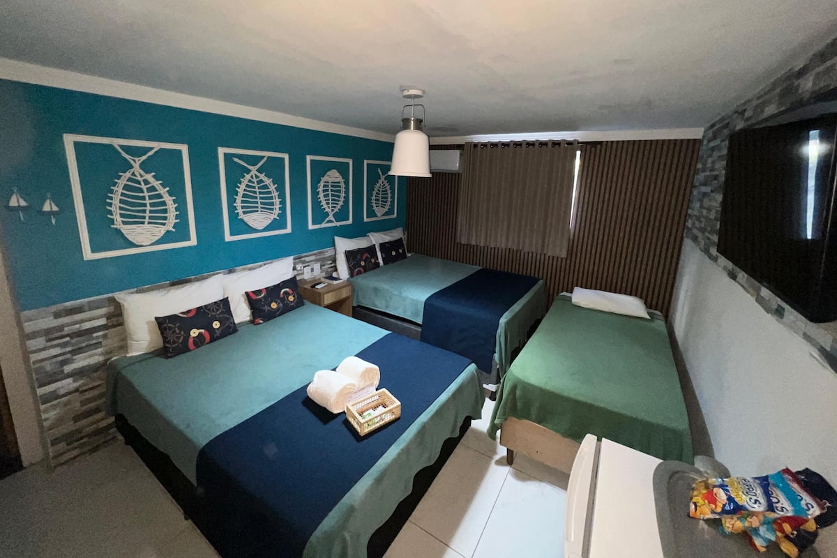 Habitación familiar | Minibar, wifi gratis y ropa de cama