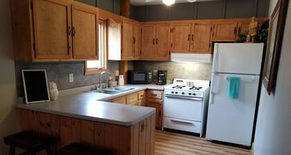 2 bedroom apartment, heated pool, rec room, located on river. 4 wheelers allowd