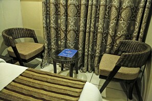 Double or Twin Room | Living area | TV
