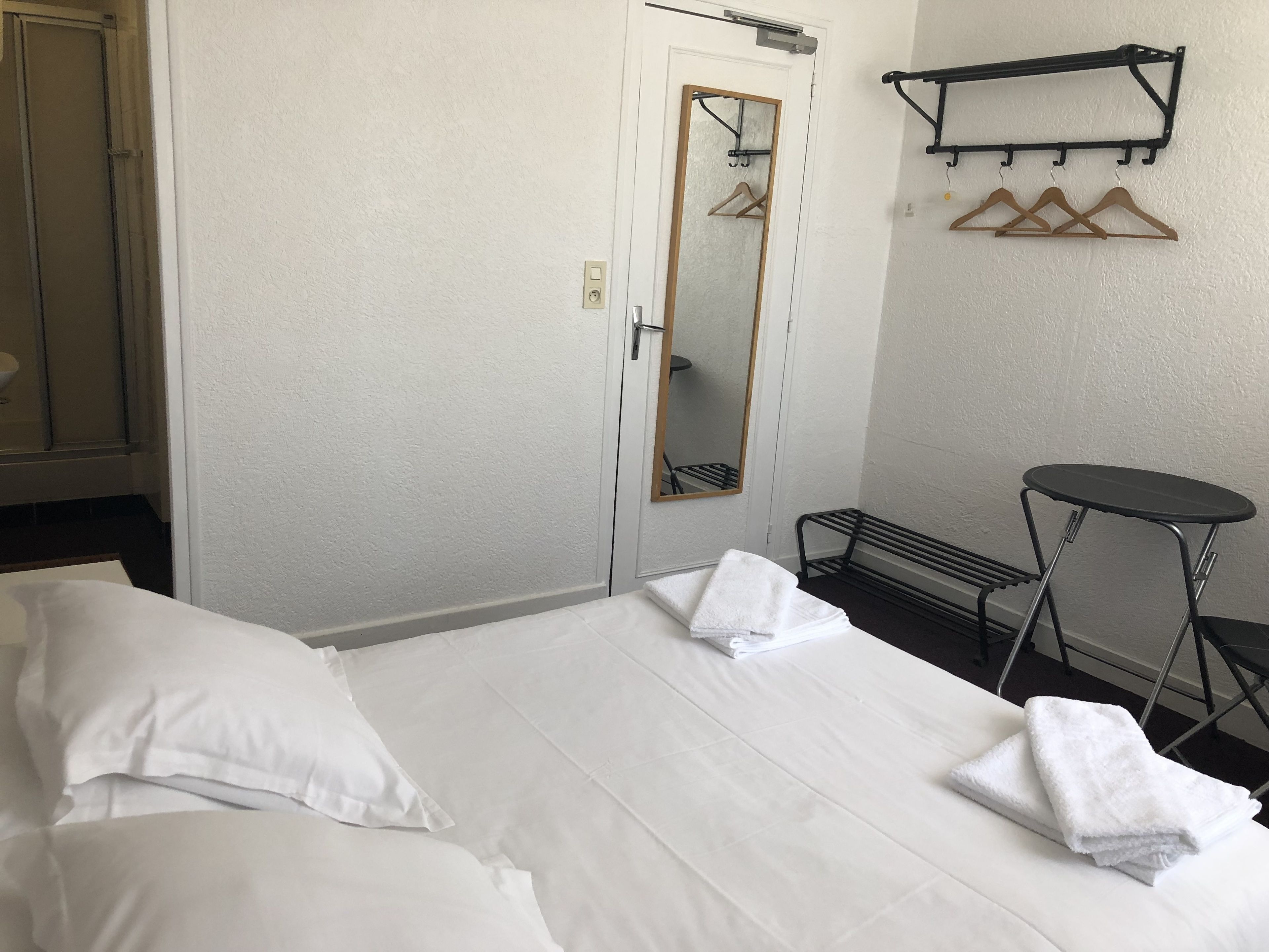 twin room, private bathroom | 1 bedroom, blackout curtains, iron/ironing board, free wifi