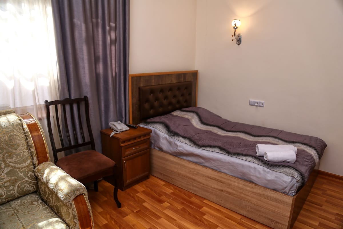 Standard Single Room, 1 Large Twin Bed, Garden View | 1 bedroom, premium bedding, minibar, desk