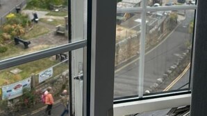 A view from a window with a clear sky and a coastal scene. - Anchor Inn by Greene King Inns (Seaton)