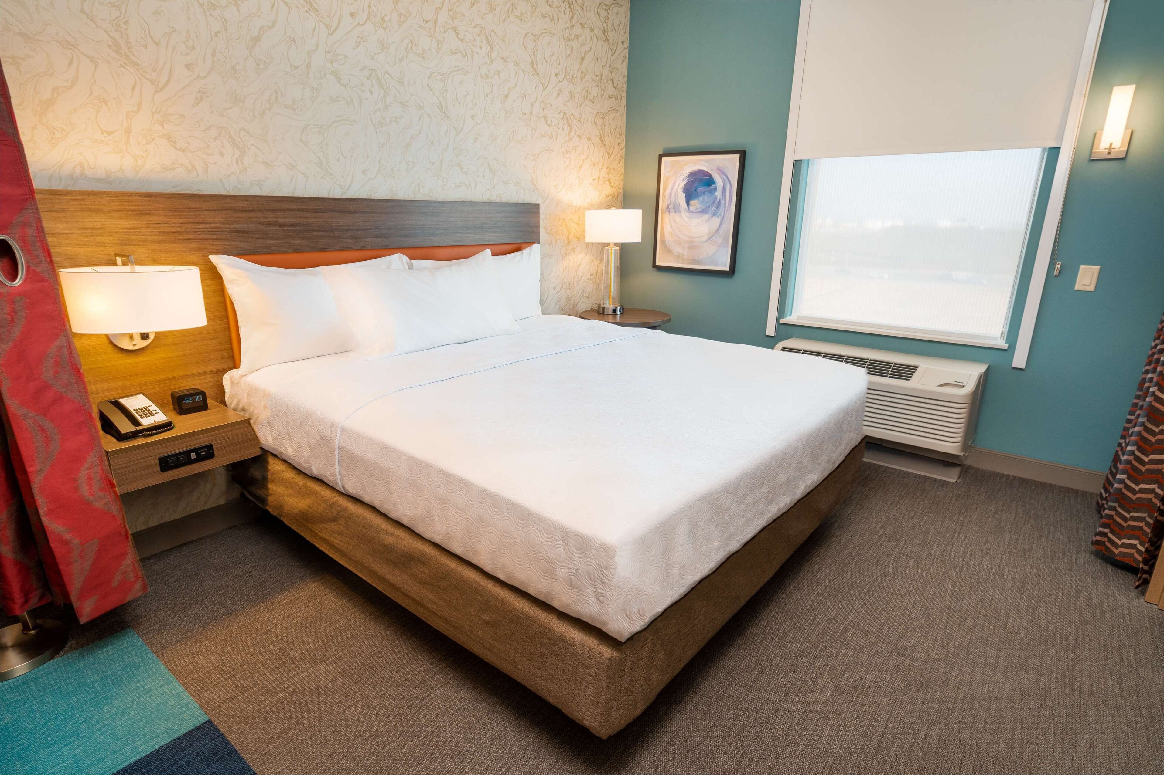 hypo-allergenic bedding, desk, blackout curtains, iron/ironing board