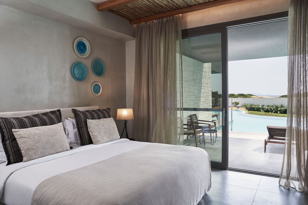 Family Suite Swim up Limited Sea View | Badkamer | Een haardroger, badjassen, pantoffels, handdoeken