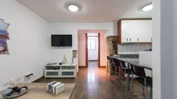 Appartement, 1 chambre | Coin séjour | Télévision à écran plat