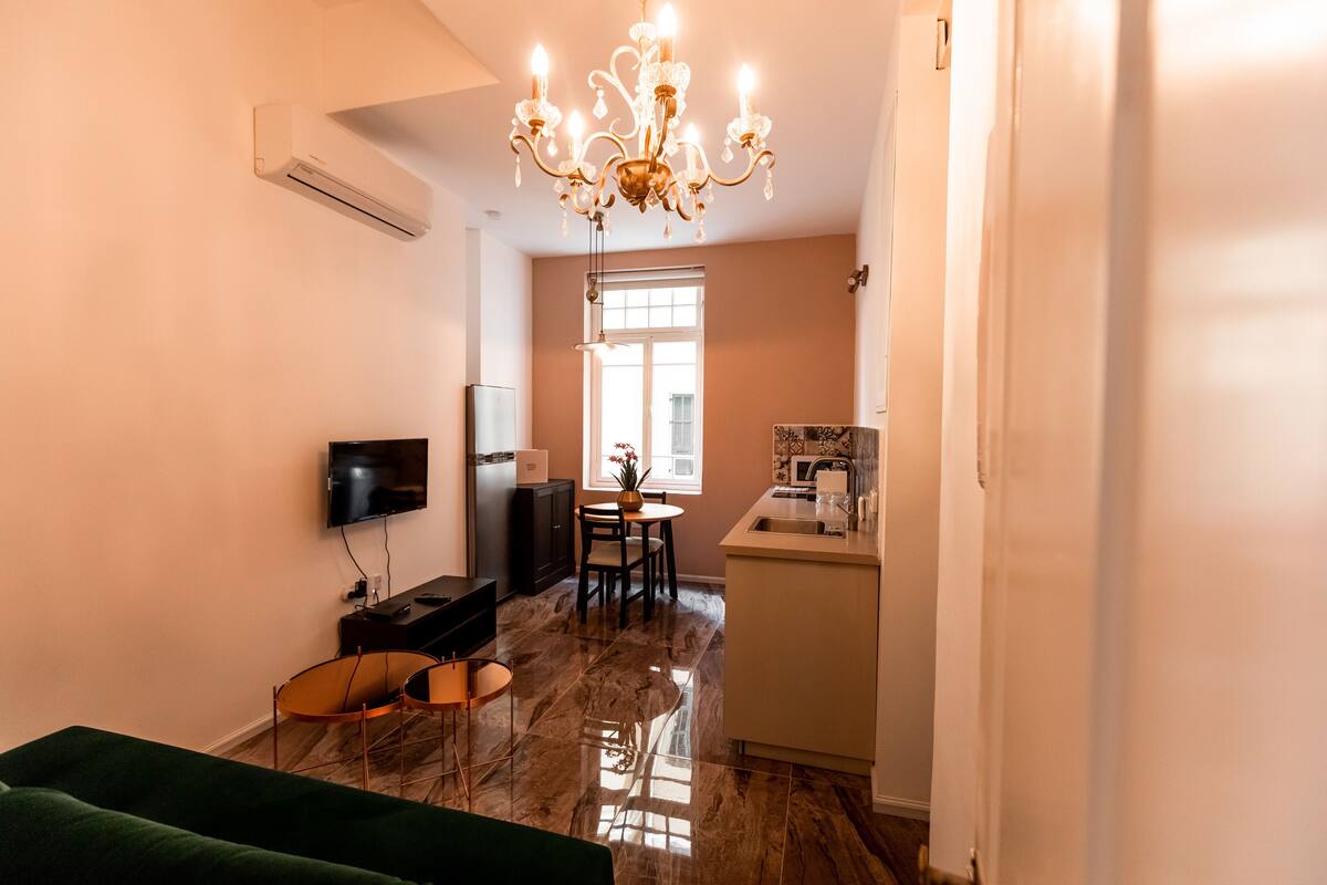 Standard Apartment | Living area | 40-inch flat-screen TV with premium channels, LED TV