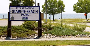 A sign for Starlette Beach Park in the City of Alpena.
