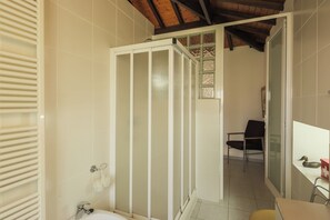 Shower, eco-friendly toiletries, hair dryer, bidet
