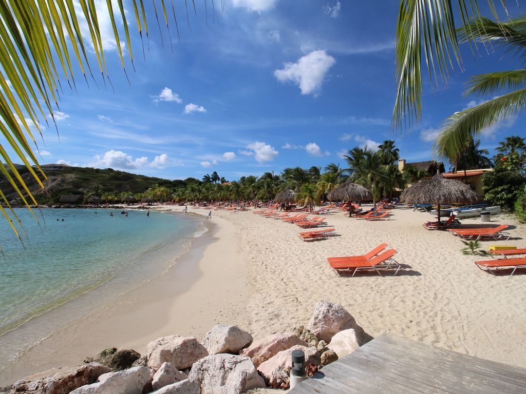 On the beach, sun loungers, beach towels
