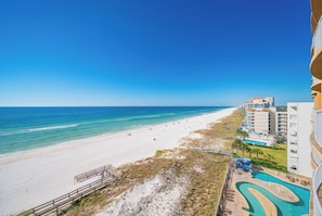 A beach view with a swimming pool and a boardwalk. - 3 Bedroom 3 Bath *6th floor* LAZY RIVER! Phoenix Orange Beach 605 (Orange Beach)