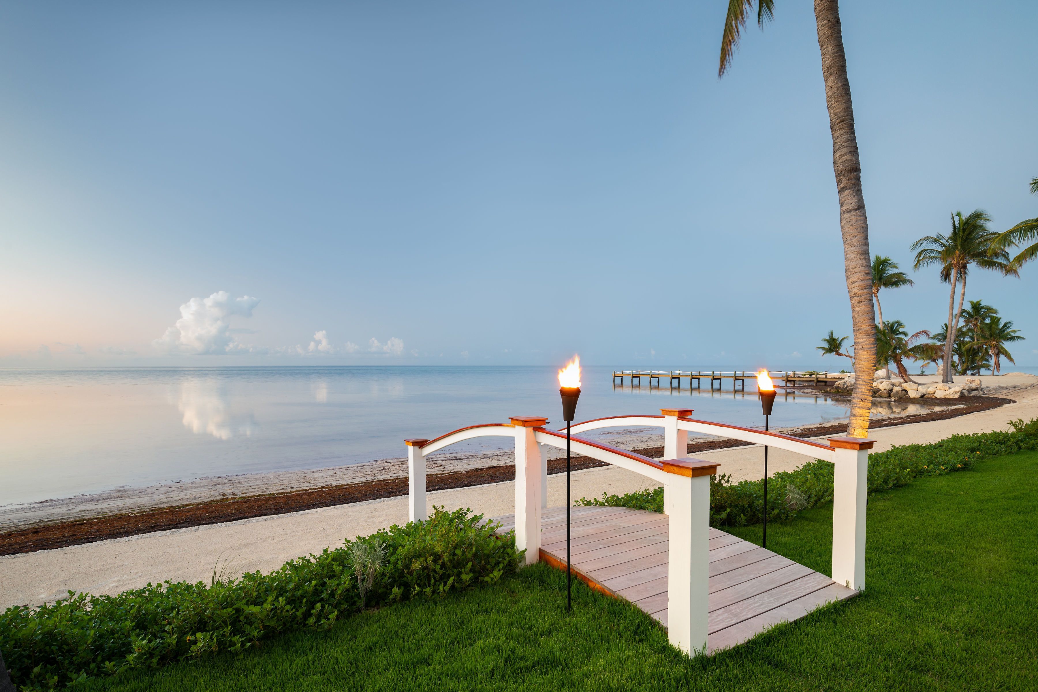 Sun loungers, beach umbrellas, beach towels, windsurfing