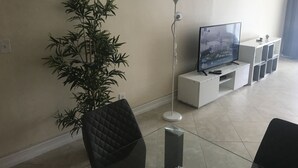 Signature Apartment, Garden View | Living area | Flat-screen TV - Ocean Reserve Condo Sunny Isles Beach (Sunny Isles Beach)