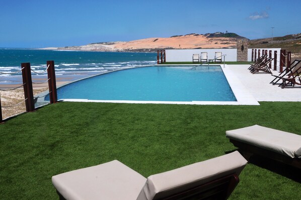2 outdoor pools, pool umbrellas, pool loungers