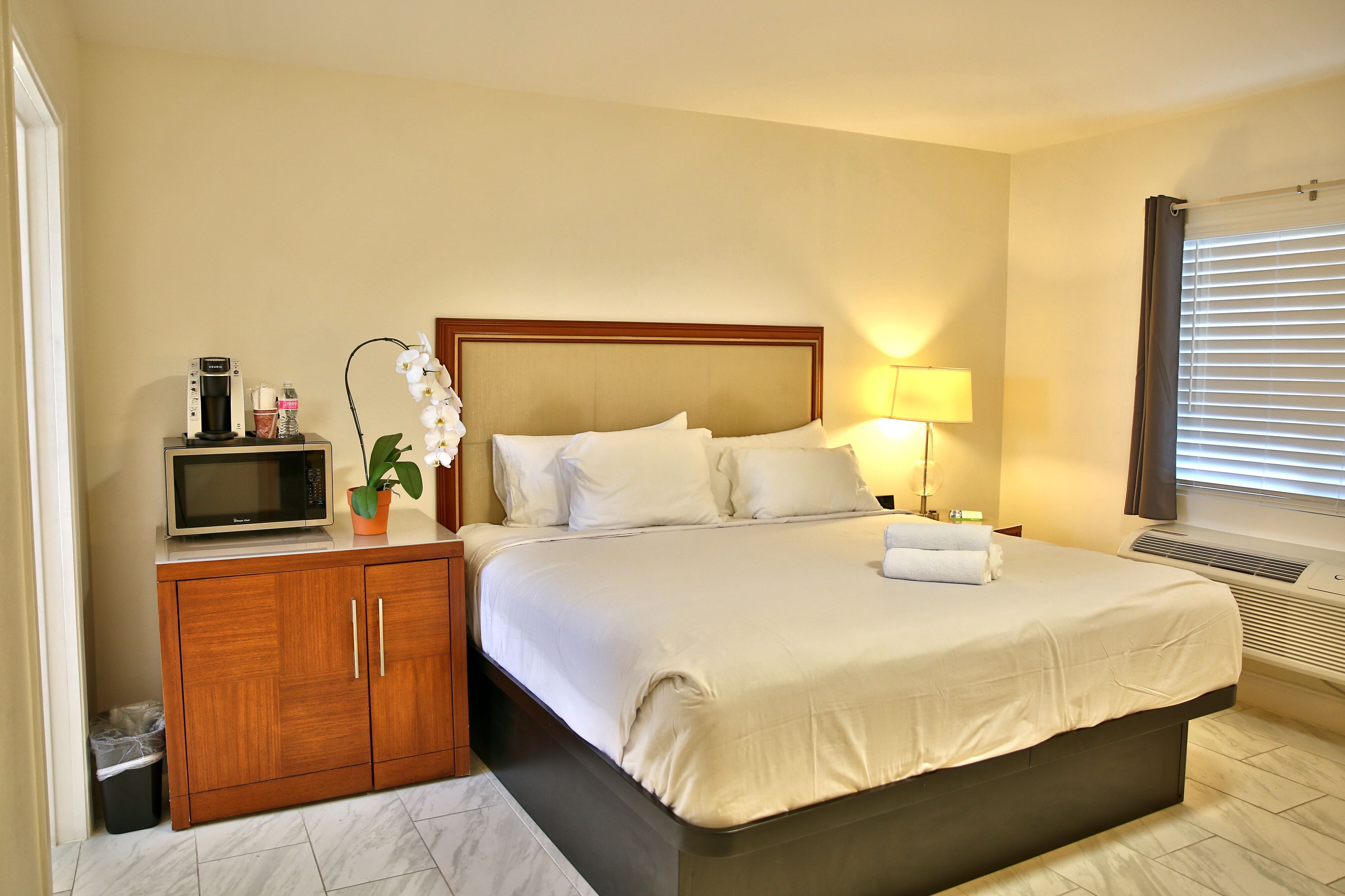 Desk, laptop workspace, blackout curtains, iron/ironing board