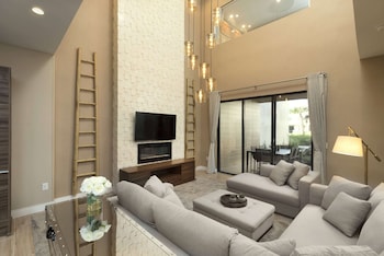 In-room safe, individually furnished, desk, blackout drapes at Magic Village Views Trademark Collection by Wyndham