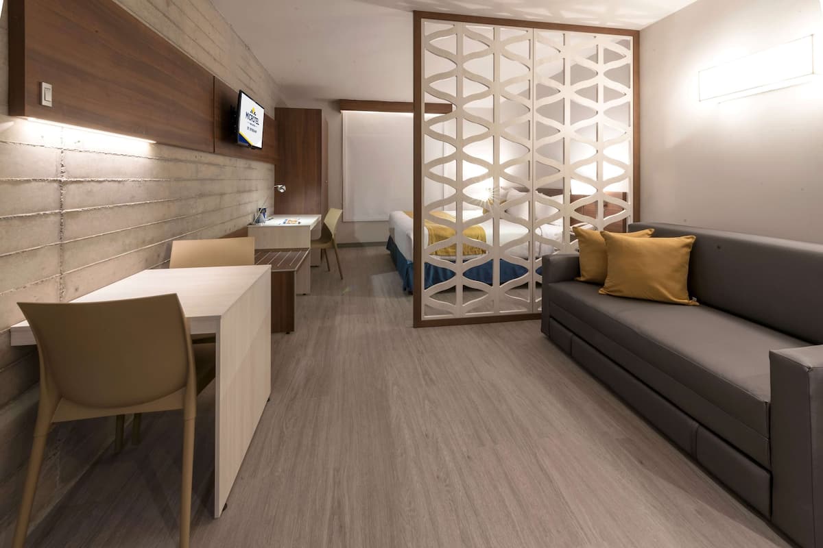 Suite, 1 King Bed, Non Smoking | Premium bedding, Tempur-Pedic beds, in-room safe, desk