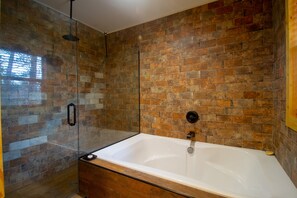 Bathtub, hair dryer, towels, soap
