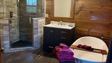 Bathtub, hair dryer, towels, soap