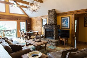 Smart TV, fireplace, books, printers