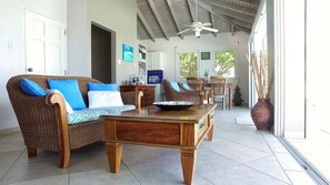 Flat-screen TV - Beach House Younes by Island Properties Online (Oyster Pond)