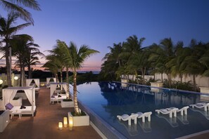 3 outdoor pools, open 8:00 AM to 8:00 PM, pool umbrellas