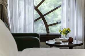 Deluxe Quadruple Room, Balcony | Free minibar items, in-room safe, desk, laptop workspace - TTR Moonstone Apart Hotel (Da Lat)