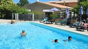 Seasonal outdoor pool, pool umbrellas, sun loungers