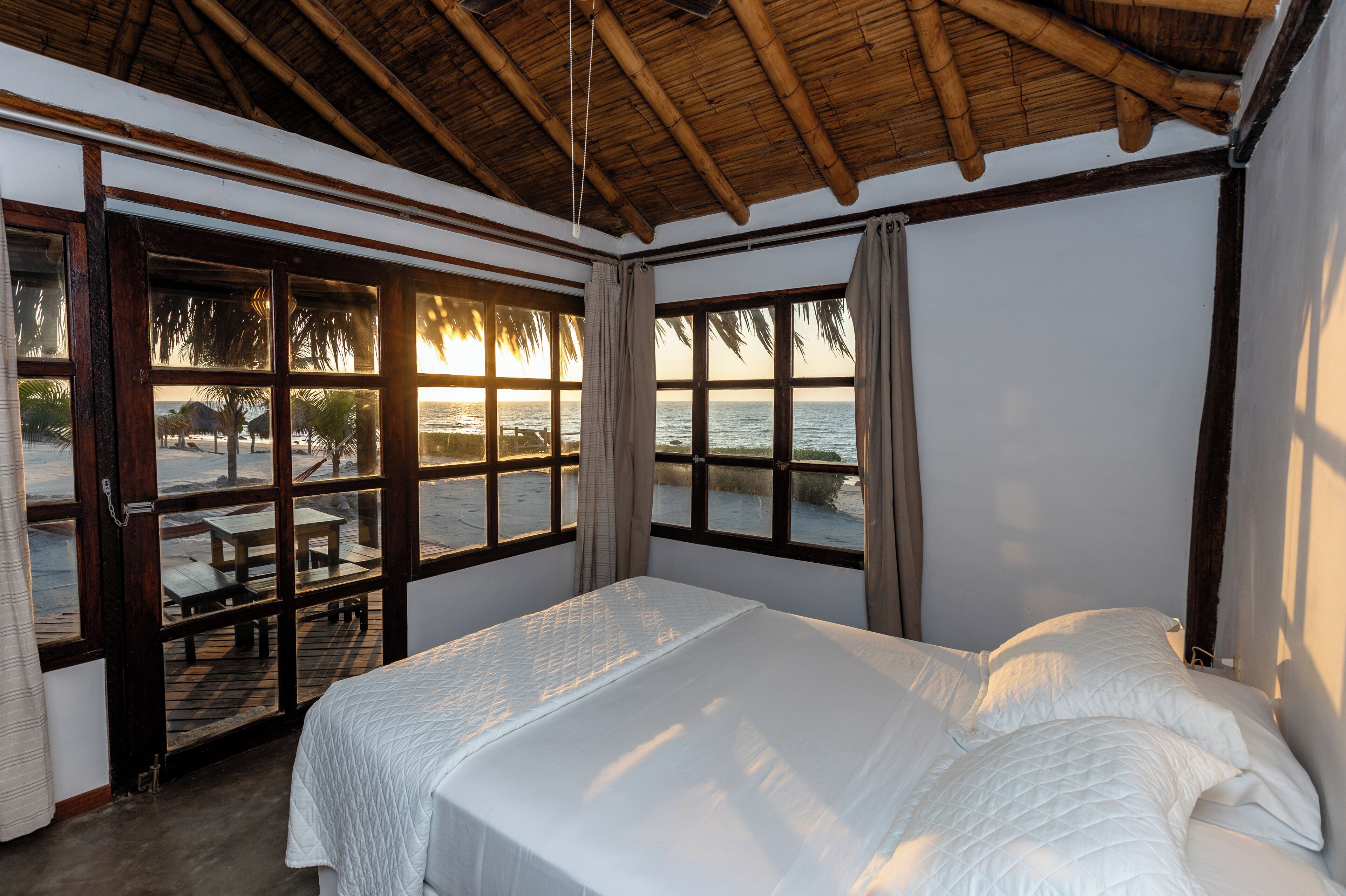 Basic Bungalow, 1 Bedroom, Beach View | Minibar, in-room safe, individually decorated, individually furnished