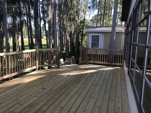 Terrace/patio - Home with garage and deck overlooking lake and golf course (North Fort Myers)