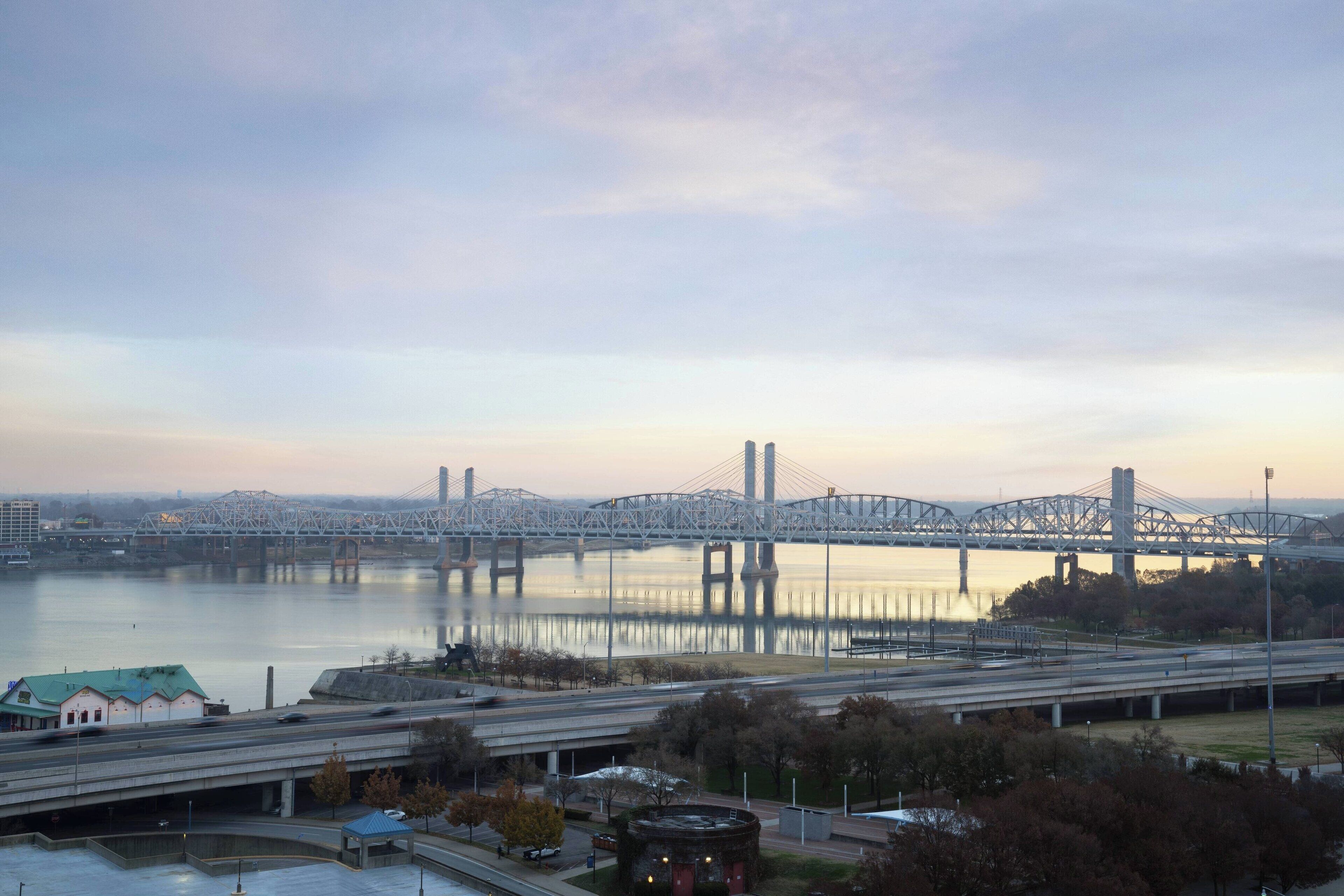 premium bedding, pillow-top beds, desk, laptop workspace