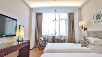 Deluxe Twin Room | Down comforters, memory foam beds, free minibar, individually decorated