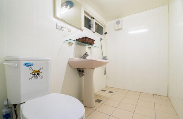 A small bathroom with a toilet, sink, and a shelf above the sink. - Julie's Garden (Ren'ai)