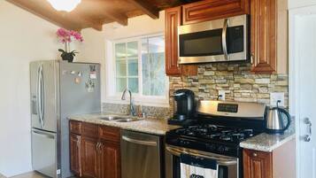 Oven, stovetop, dishwasher, coffee/tea maker