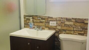 Bathtub, spring water tub, hair dryer, towels