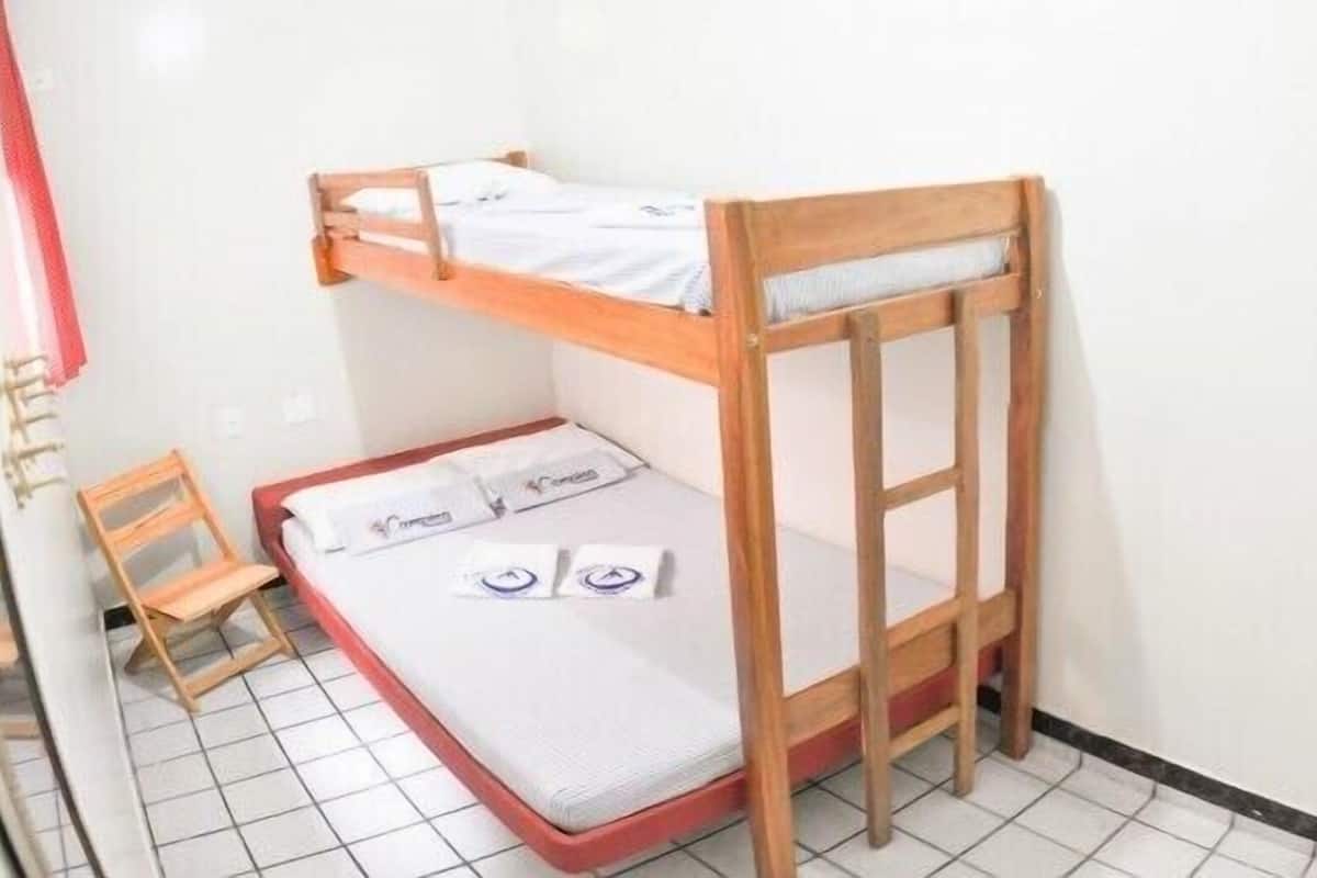 Habitación triple familiar | Ropa de cama