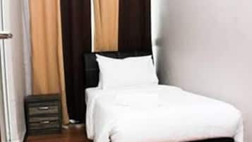 Habitación individual estándar | Caja de seguridad en la habitación y wifi gratis