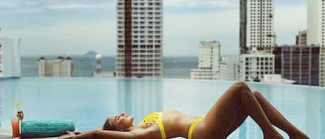 Outdoor pool, pool umbrellas, pool loungers