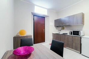 Fridge, stovetop, electric kettle, toaster