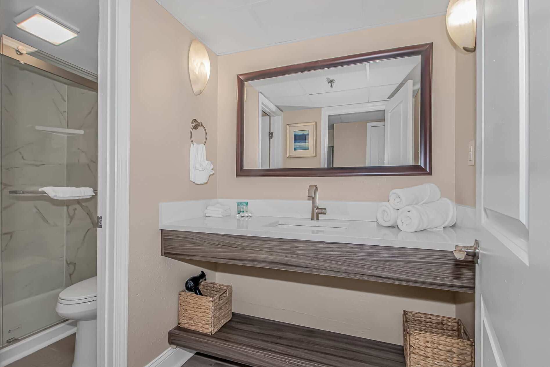 Combined shower/tub, hair dryer, towels, shampoo